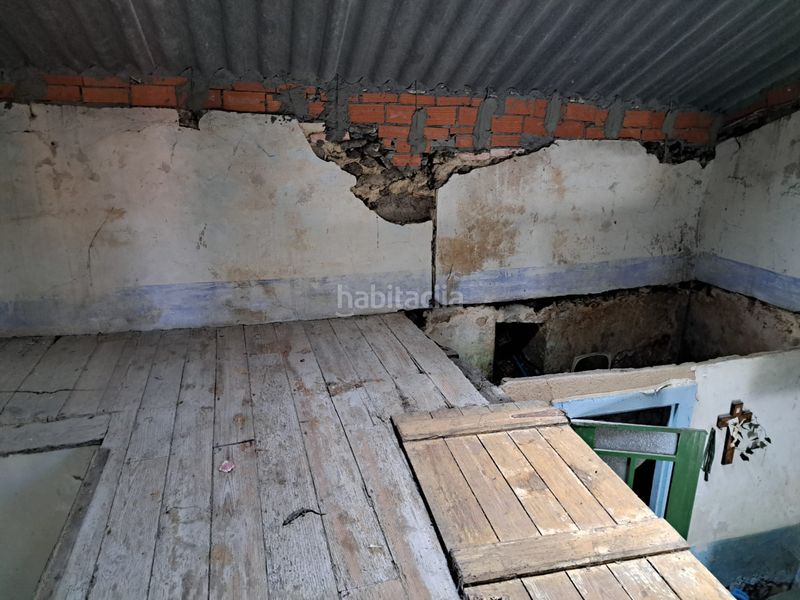 Foto b96bb0a2-a0d0-42bf-b62d-c8d423693d79. Casa adossada a Dodro