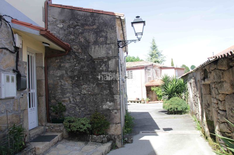 Foto d724b2b2-4083-4585-93a9-7d1cf47f0e6e. Casa adossada a Dodro