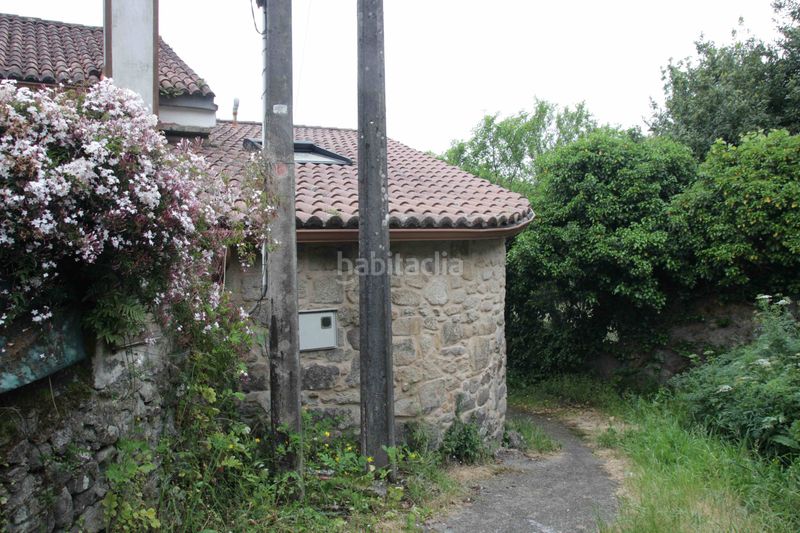 Foto 18658f64-de90-49c7-bfe5-543e23d18dab. Casa aparellada a Padrón