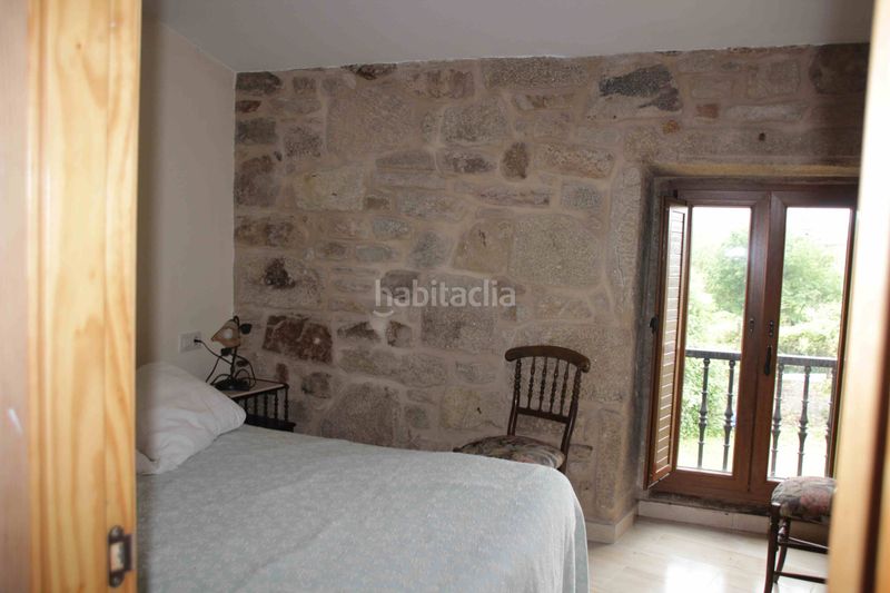 Foto 2e4a513d-475b-4c5d-b17d-c3a491ac312c. Casa aparellada a Padrón