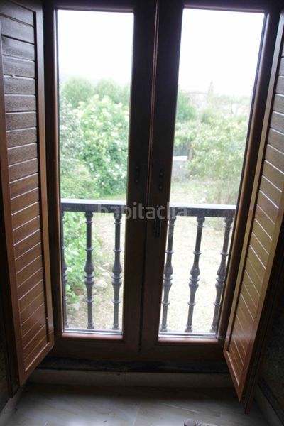 Foto 590ea206-611d-4258-8c55-bc1257def2cf. Casa aparellada a Padrón