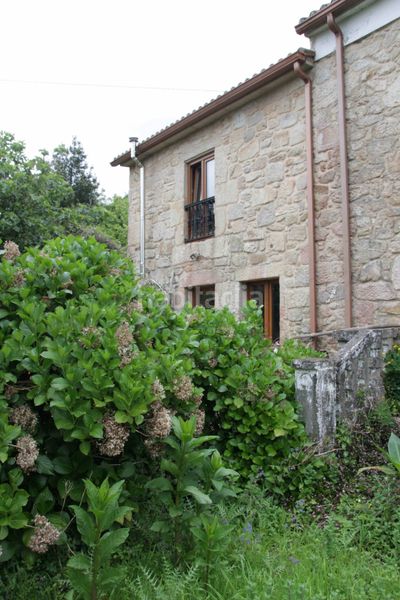 Foto a202d9c1-8a92-496c-9441-da7afe957cb5. Casa aparellada a Padrón