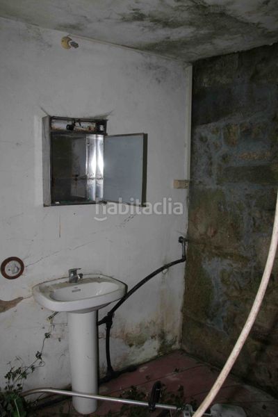 Foto 09b5ee0b-15e1-4ab5-82e7-92d1843ed27d. Casa aparellada a Padrón