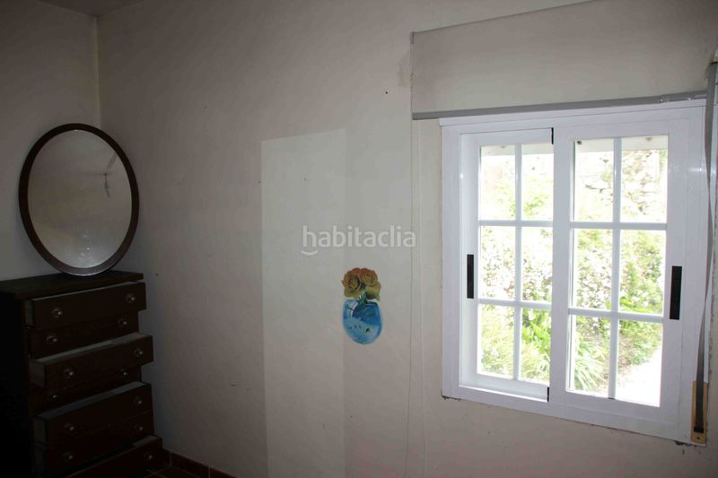 Foto 10d9d843-4856-45b2-aa3b-028b6cf9f02d. Casa aparellada a Padrón