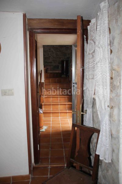 Foto 6a580b7c-c6c3-47a6-bae5-a0354fe59c25. Casa aparellada a Padrón