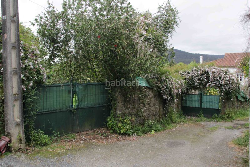 Foto ca6e091a-b792-4c0e-89f0-9bb44b12ba3d. Casa aparellada a Padrón
