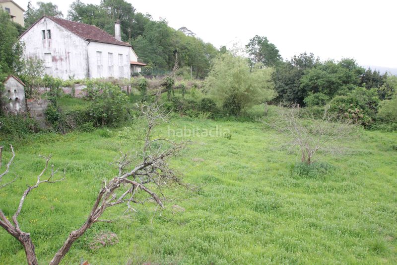 Foto d19c69fd-f853-4604-b43b-058c045a23f5. Casa aparellada a Padrón
