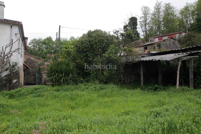 Foto e032ffde-da9b-4c6f-a1b3-e23b9ba001ea. Casa aparellada a Padrón