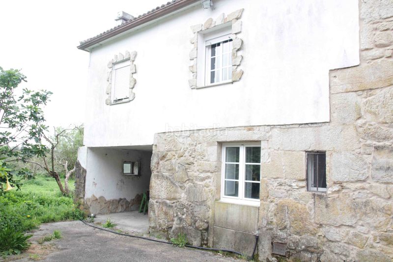 Foto faeac04d-651d-4c9d-9a87-1d62afa8b1f3. Casa aparellada a Padrón