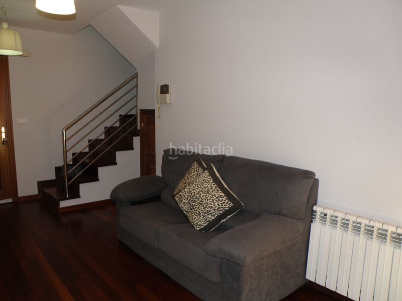 Foto d6f31433-bdfa-4724-88b6-c6b228c1ce32. Affitto duplex con riscaldamento parcheggio in O Milladoiro Ames