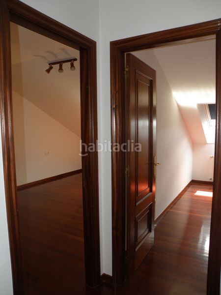 Foto 44b961aa-9988-4a29-86b4-3cdd0fc488d0. Duplex con riscaldamento parcheggio in O Milladoiro Ames