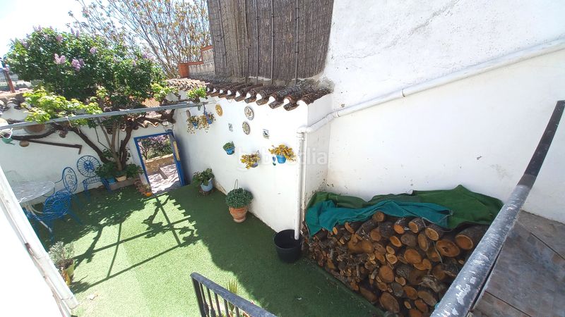 Foto 4f2b5493-0a94-48bd-a20f-b9a379b6d962. Casa adossada amb xemeneia a Higueruela