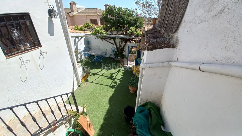 Foto 727ea61f-bcd9-4b4d-87e4-f9c547417ade. Casa adossada amb xemeneia a Higueruela