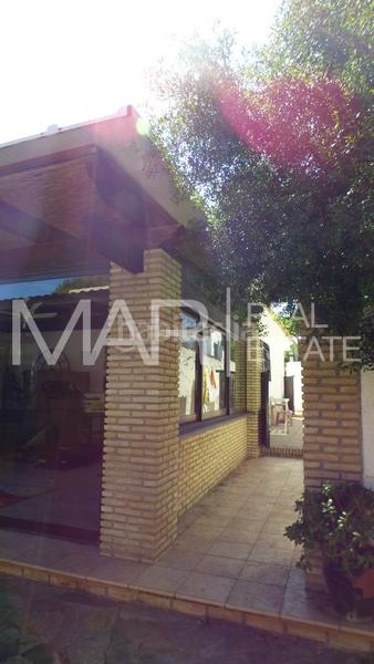 Foto 65be0543-aa04-4192-b6bc-e7af1db2fbe9. Chalet avec parking piscine dans La Barrosa Chiclana de la Frontera