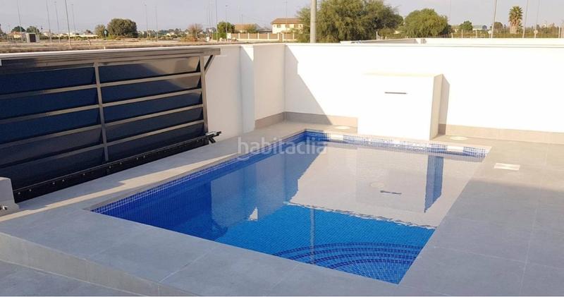 Foto 55477a47-bf5d-43c6-856f-0dc47e1cc4bd. Casa adossada amb aparcament piscina a Daya Nueva