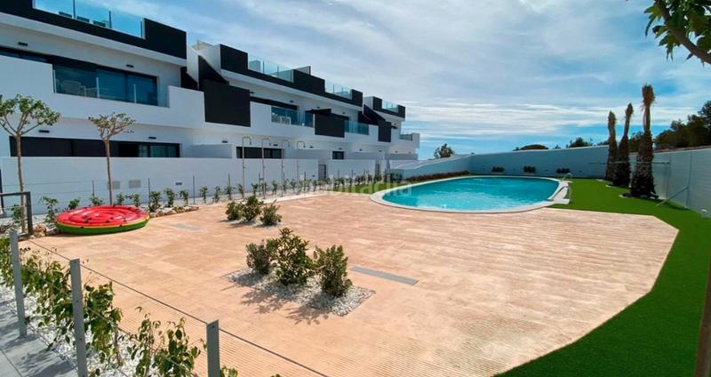 Foto 40910472-1326-4a35-b304-5d7f947a88d8. Doppelhaus mit parking pool in Los Balcones-Los Altos Torrevieja