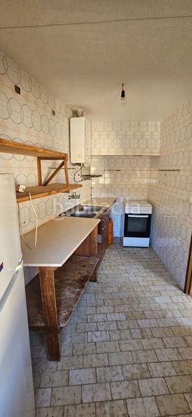 Foto e5c782e0-d461-4465-afc7-bb85db610678. Casa adossada amb xemeneia a Hoyos