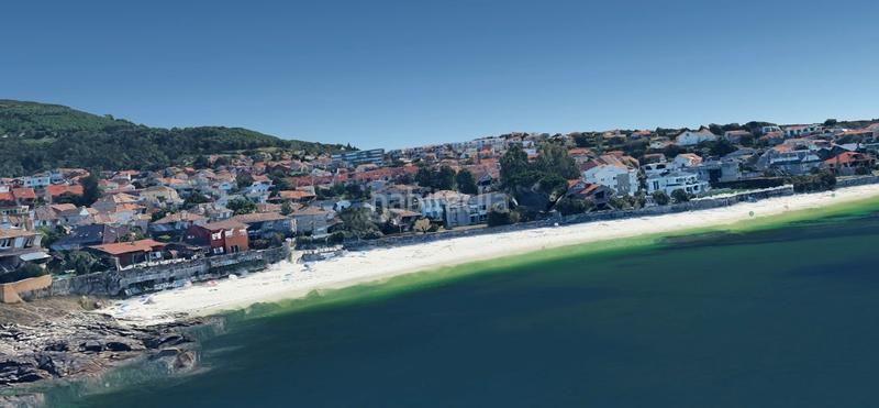 Foto f16729e5-b3ff-418e-b9dd-ac99090359e4. Chalet  en primera línea de playa canido en Vigo