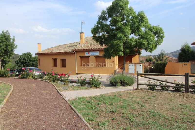 Foto 99353170-b5fb-471e-bb2d-d02eb7a9ce18. Casa adossada a Atazar (El)