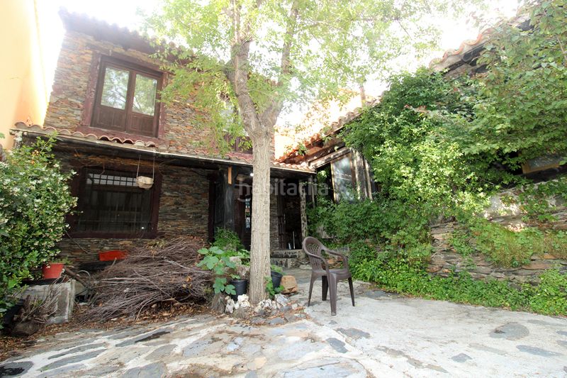 Foto c35656d5-5bd1-4e92-9e6b-219b4f926874. Casa adossada a Atazar (El)