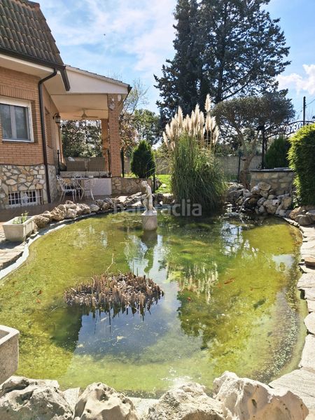 Foto b5307ea1-3c66-4c61-a6f7-03cac325a083. Maison avec cheminée chauffage parking piscine dans Uceda