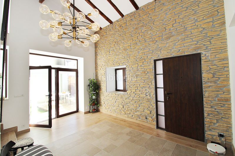 Foto b8ca3d5c-35cd-412e-badf-b81a2d5d58a0. Casa adossada amb calefacció piscina a Torrelaguna