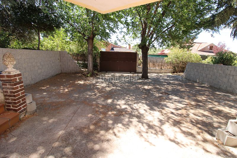 Foto fce7bba6-ec17-48d2-ba19-fa021fe286f4. Haus mit kamin heizung parking pool in Uceda