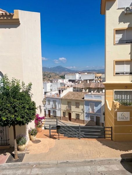 Foto 065289f6-3f56-4f89-a497-533856256be5. Casa adossada amb xemeneia aparcament a Coín