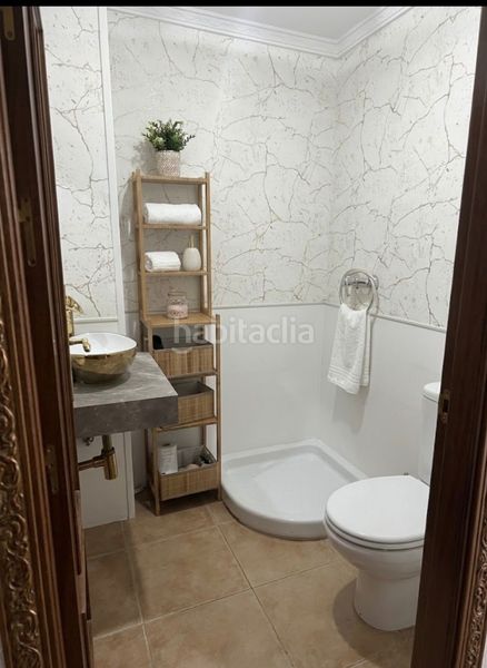 Foto f7c285fd-8350-45ae-90df-4f372744d18e. Casa adossada amb xemeneia aparcament a Coín