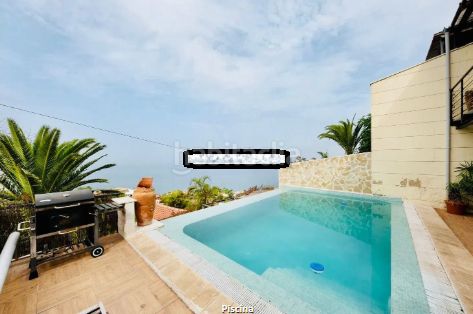 Foto c0df1eaf-88c0-411f-b061-3b92d79d54c6. Casa aparellada amb aparcament piscina a Cuesta de la Villa Santa Úrsula
