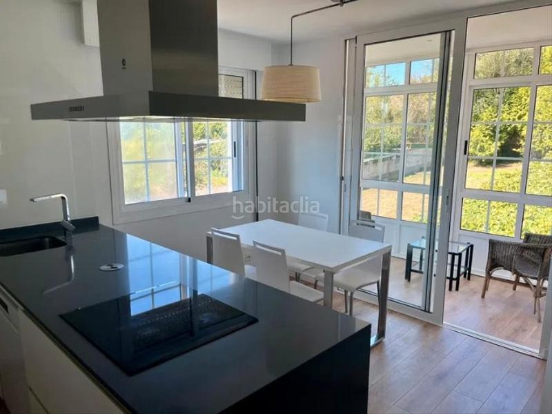 Foto b8e579a8-bcfb-40f7-9bb5-a2075305ab40. Chalet en área de Ames Ames