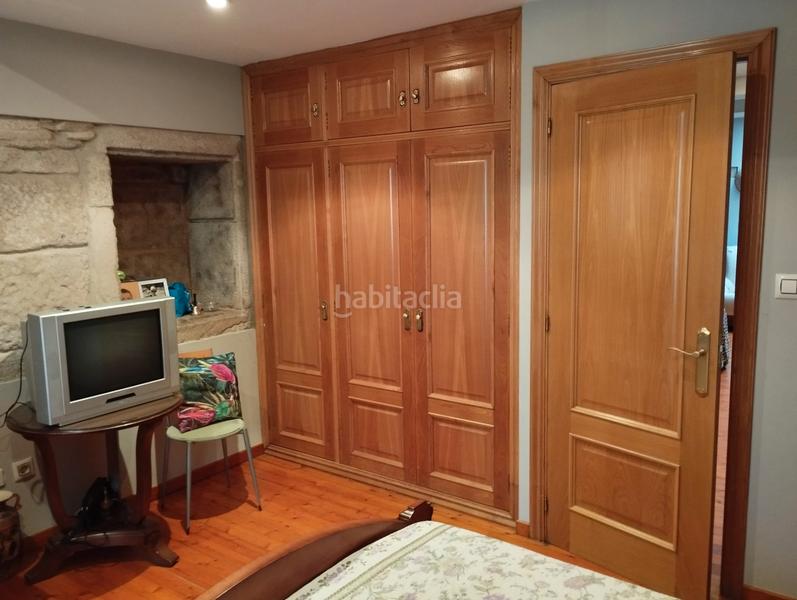 Foto 04a68bb0-7c77-484a-ae3f-7dc0a0e05149. Casa adossada amb xemeneia calefacció a Campus Norte - San Caetano Santiago de Compostela