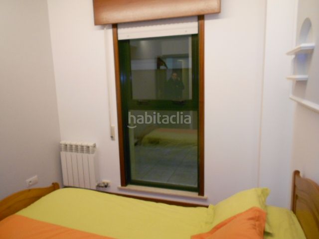 Foto 98e93c76-4bd7-4b0e-b239-65f28c311920. Rent flat with heating parking in O Milladoiro Ames