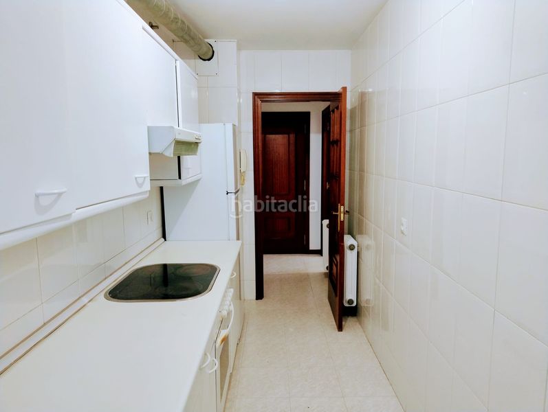 Foto 8789e1b0-0774-4b5f-a8ff-dbe70bdcebfd. Appartamento con riscaldamento parcheggio in O Milladoiro Ames
