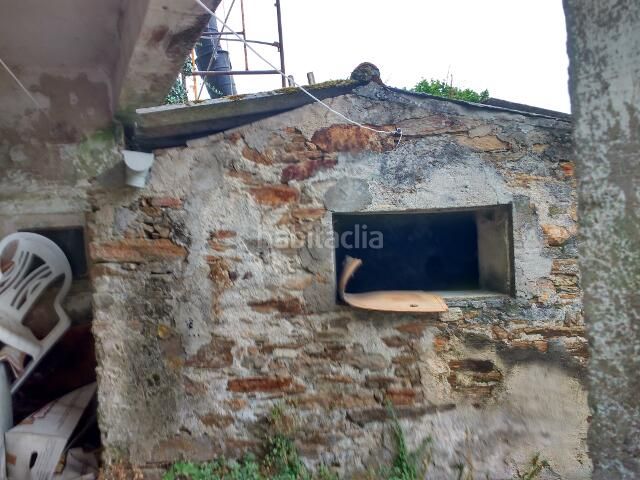 Foto fccbdde0-be59-4c6d-8b83-7ee7a2d3dc7e. Casa adossada a Ensanche - Sar Santiago de Compostela