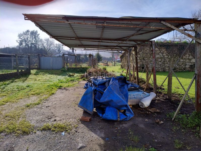 Foto 209e8cca-eab6-42a1-8540-ef52a57fac36. Casa adosada en Teo