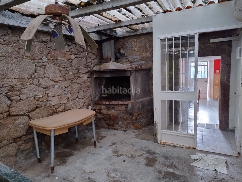 Foto 68a2368f-f43a-41da-a084-86982a756fff. Casa adosada en Teo
