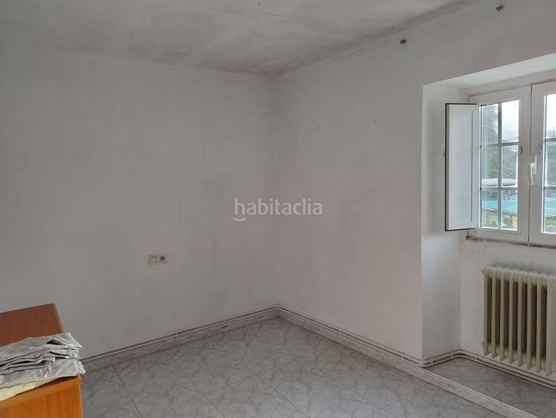 Foto 49f1f9ee-31bc-40d3-addc-2ea045c15506. Casa adossada amb calefacció aparcament a Teo