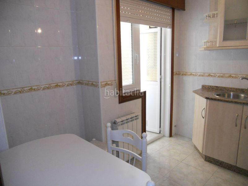 Foto 14c475ea-495f-4b0f-8125-2ff3695bfc7c. Rent flat with heating parking in O Milladoiro Ames