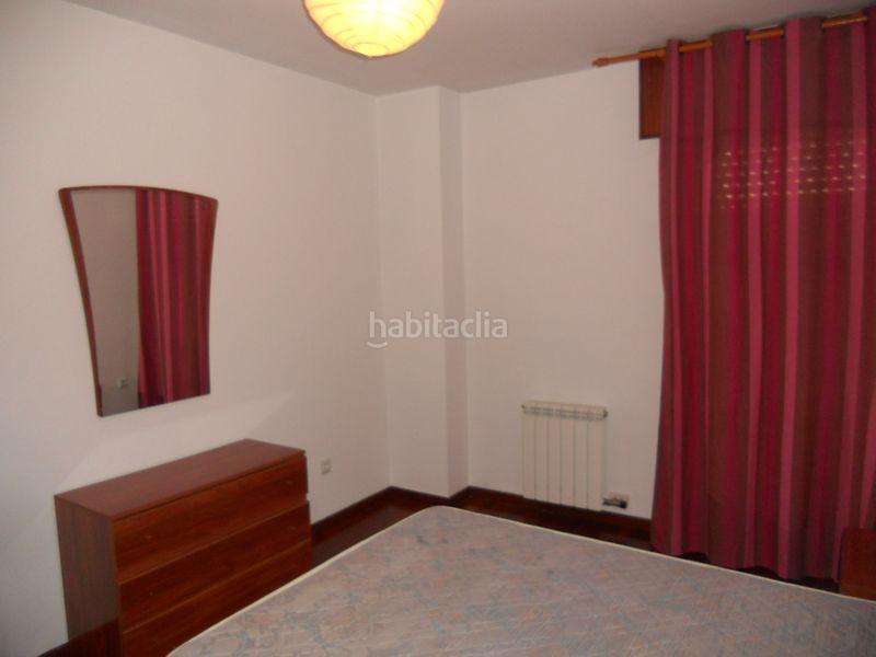 Foto 353e67df-6ae7-439a-8ef0-76cb12282427. Rent flat with heating parking in O Milladoiro Ames