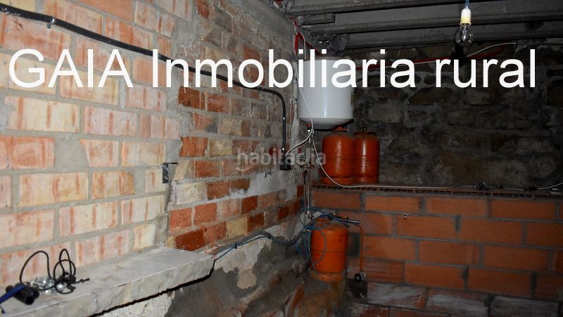 Foto 62ff823b-942b-4fcb-a67f-4d241f0293a3. Casa adossada a Maella