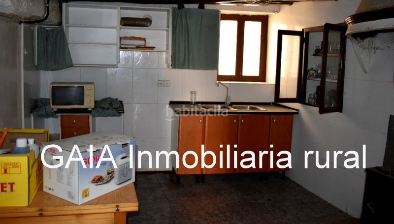 Foto aa96d42e-2cac-4326-a394-46173cf7f577. Casa adossada a Maella