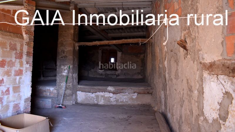 Foto c14ed6aa-88db-44da-a1a4-4f1ad47c1ac3. Casa adossada a Maella