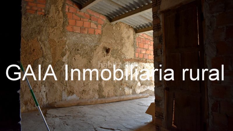 Foto f0d0cb03-1e6f-46f9-89a6-d161ef7c4968. Casa adossada a Maella