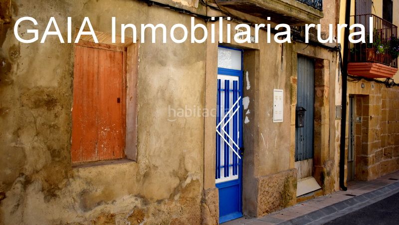 Foto 1dd625ed-03f9-4481-90f9-eb204ed02e1c. Casa adossada a Maella