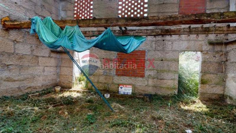 Foto c80bea06-3373-49ff-8c84-f4368a26ab64. Casa adosada en A Salgueira - O Castaño Vigo
