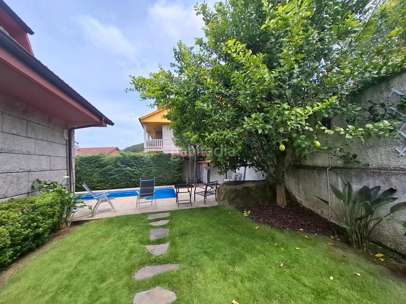 Foto 1a457f1c-65c8-49f8-aaa0-bfe945d620af. Casa con camino riscaldamento parcheggio piscina in Porriño (O)