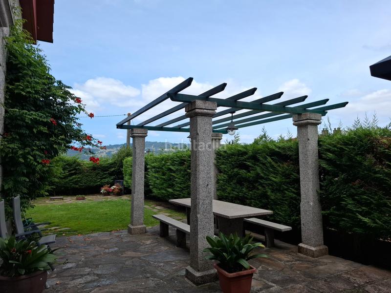 Foto 90ede993-2b33-4d1b-90b7-5be4e8001b16. Casa con camino riscaldamento parcheggio piscina in Porriño (O)