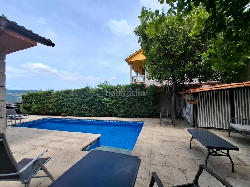 Foto a481d6db-cf52-4d05-a9c1-f87f831b9eed. Casa con camino riscaldamento parcheggio piscina in Porriño (O)
