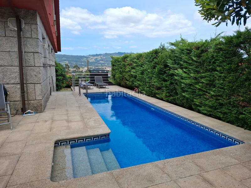Foto bf4ffbda-8cb5-4fd8-a497-3415624f9812. Haus mit kamin heizung parking pool in Porriño (O)